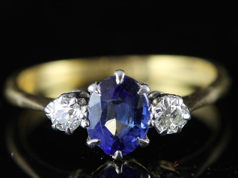 Gorgeous ceylon sapphire and diamond 18 carat gold trilogy ring