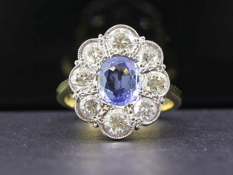 Stunning ceylon sapphire and diamond 18 carat gold cluster ring