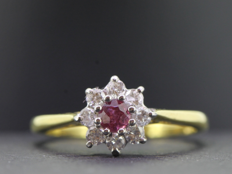 Lovely ruby and diamond 18 carat gold cluster ring