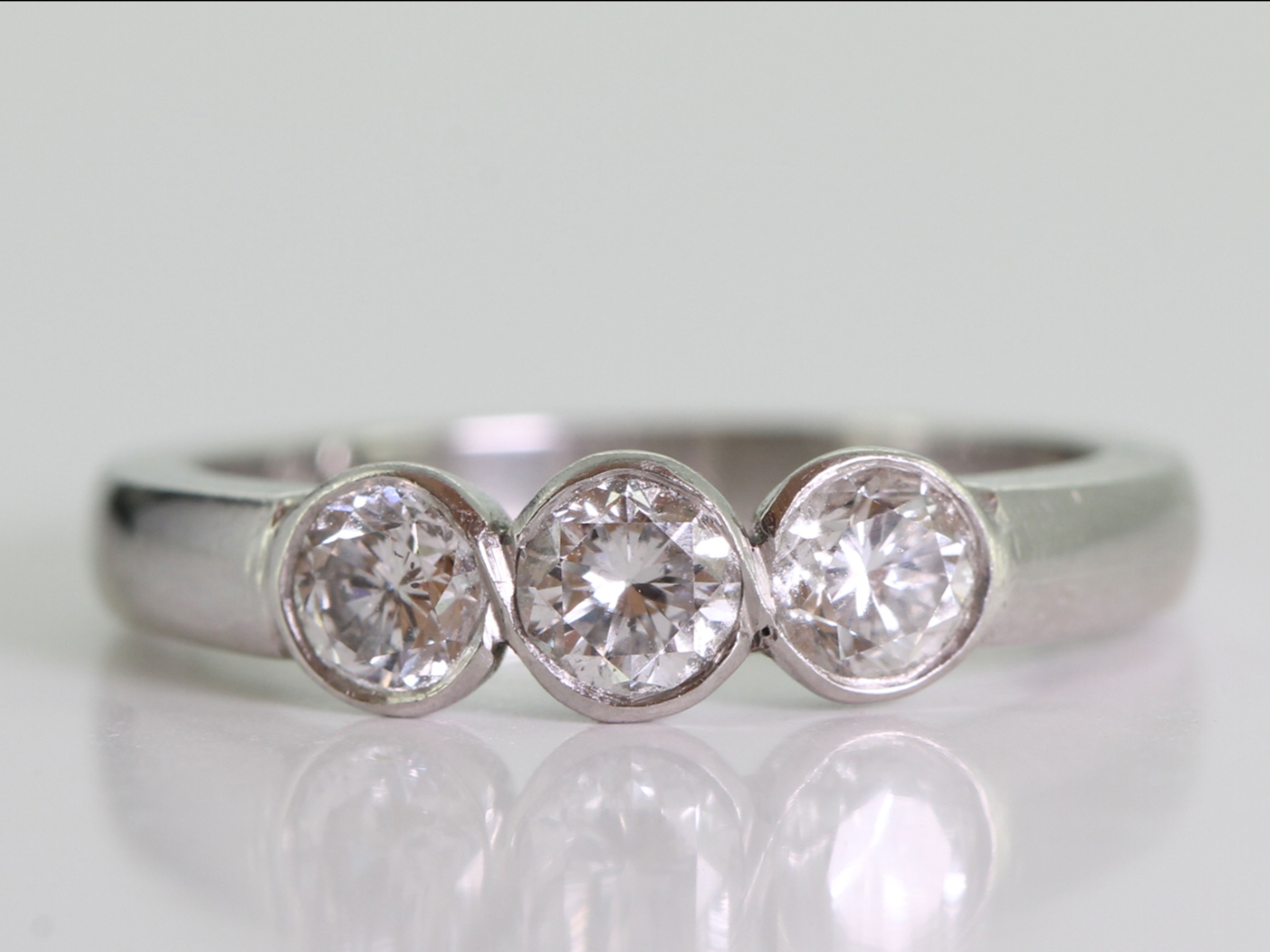 Elegant diamond trilogy platinum ring