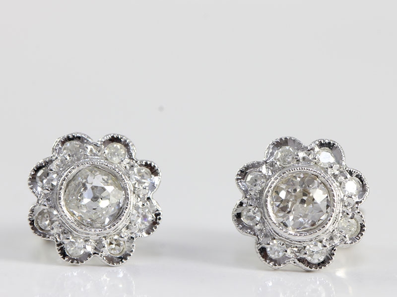 Pretty diamond daisy cluster 18 carat gold stud earrings