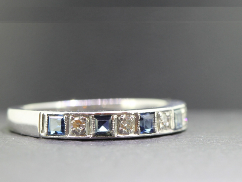 Elegant sapphire and diamond 18 carat gold half eternity ring