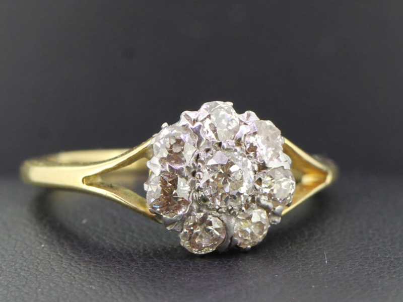 Breathtaking diamond daisy 18 carat gold cluster ring
