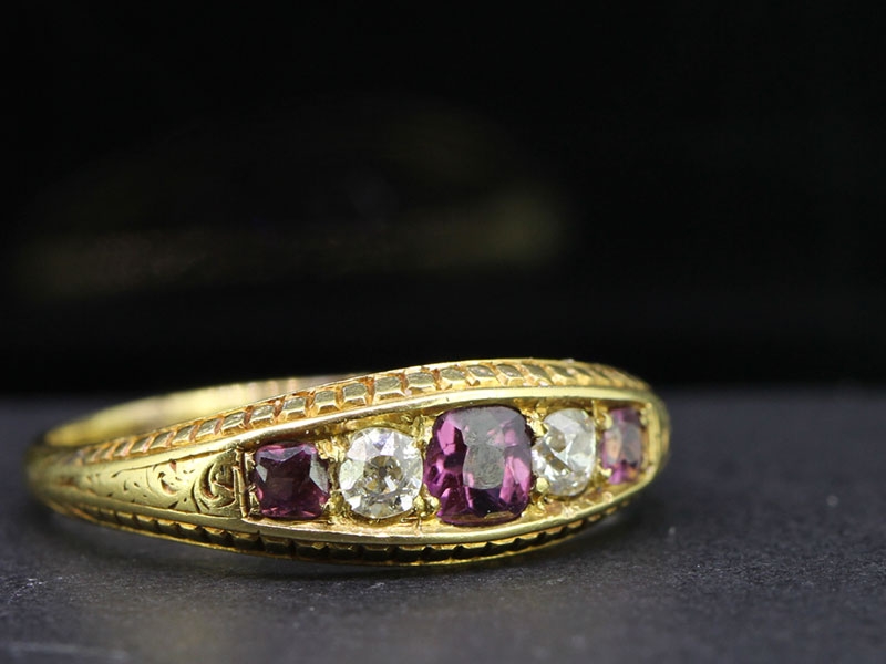 Gorgeous ruby and diamond 18 carat gold gypsy ring
