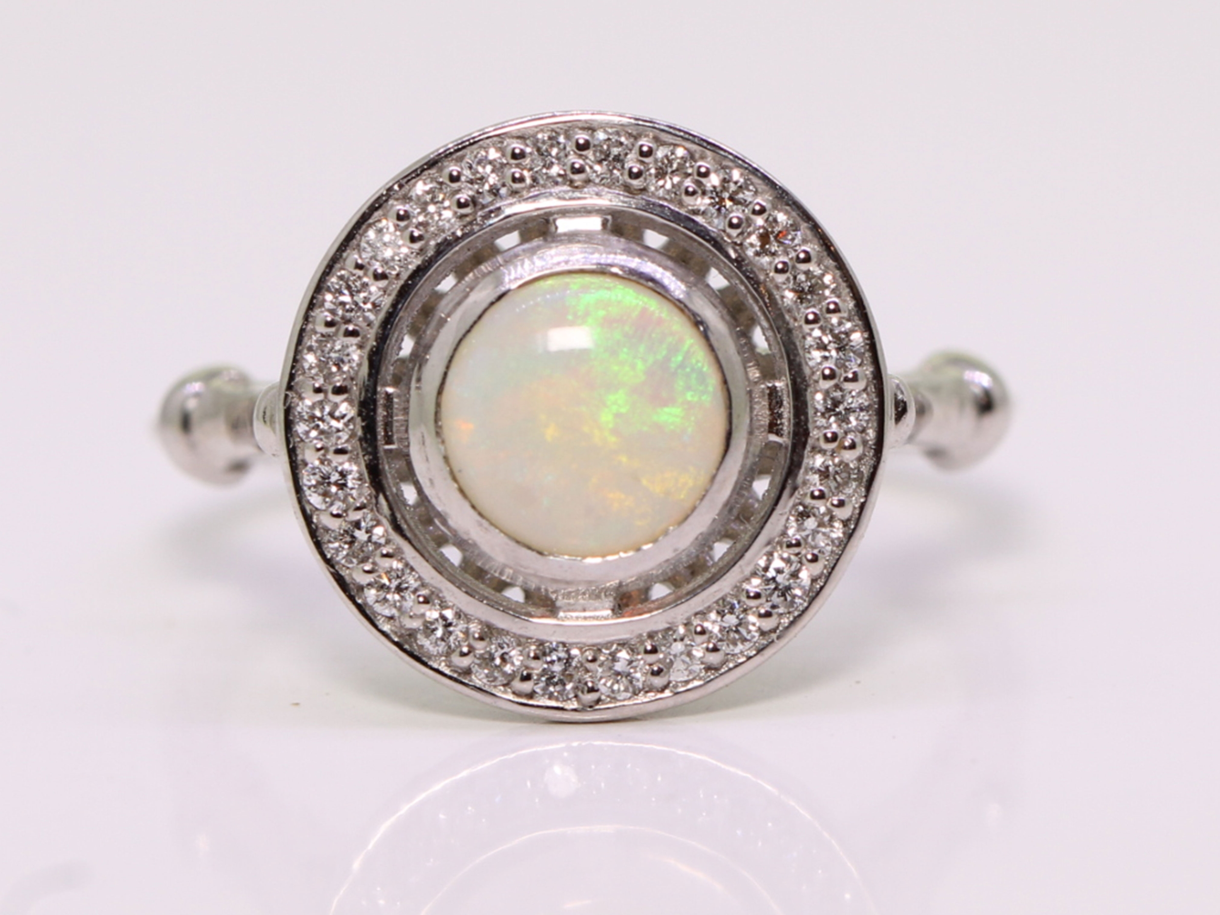 Art deco style opal and diamond 18ct gold ring