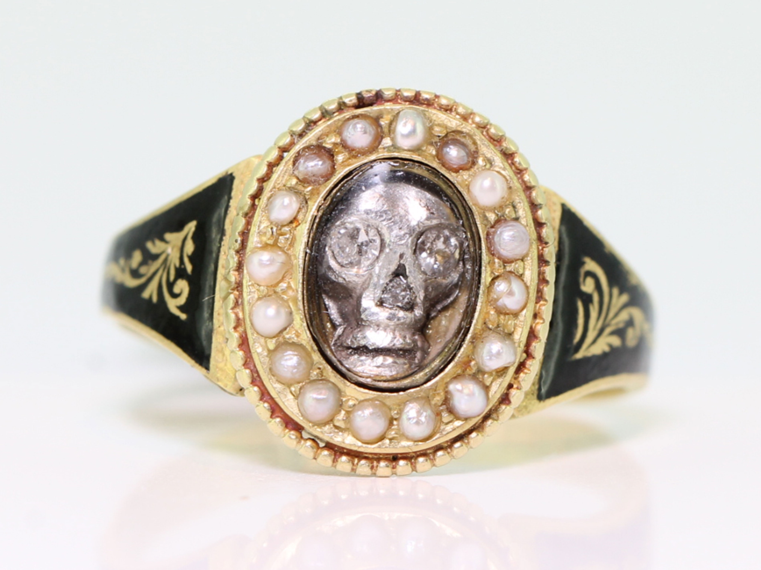 Wonderful victorian diamond  set skull pearl and black enamel 18 carat gold mourning ring