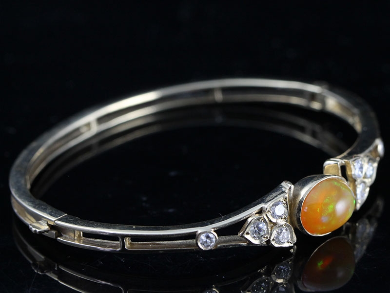 Exceptional opal and diamond 9 carat gold bangle