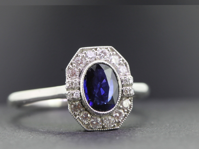 Wonderful sapphire and diamond cluster platinum ring