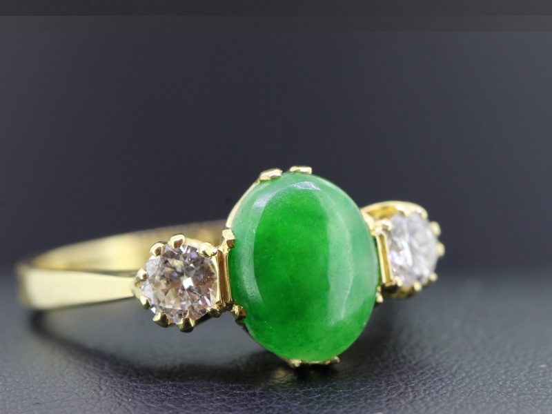 Wonderful  jade and diamond 18 carat gold trilogy ring