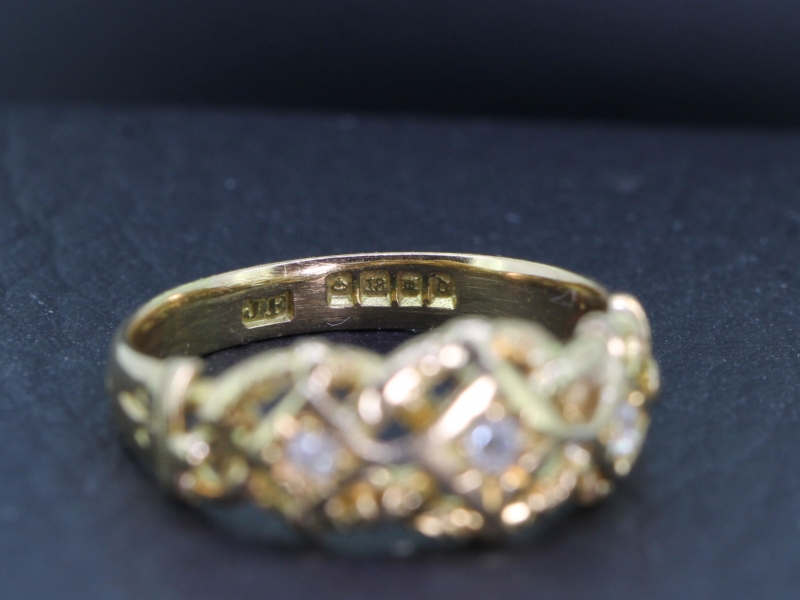 Stunning chesterfield diamond love knot 18 carat gold ring