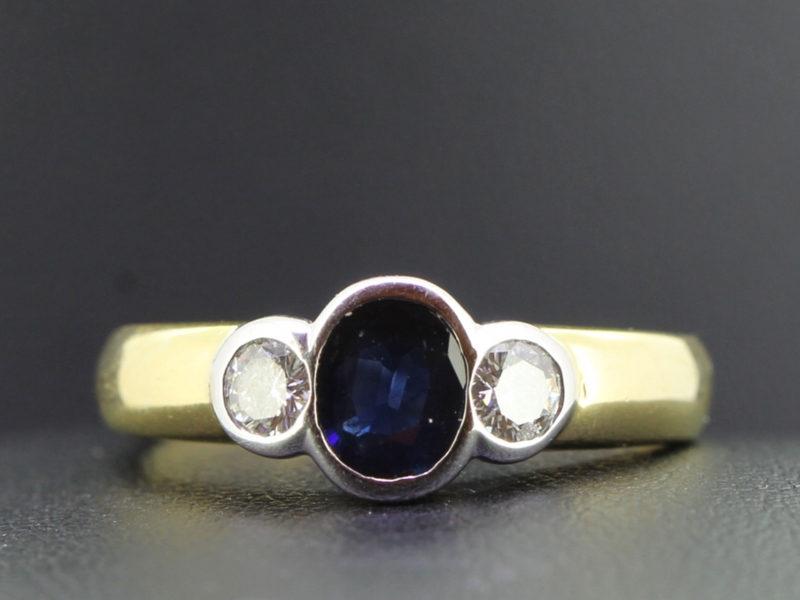 Wonderful sapphire and diamond rub over 18 carat gold ring
