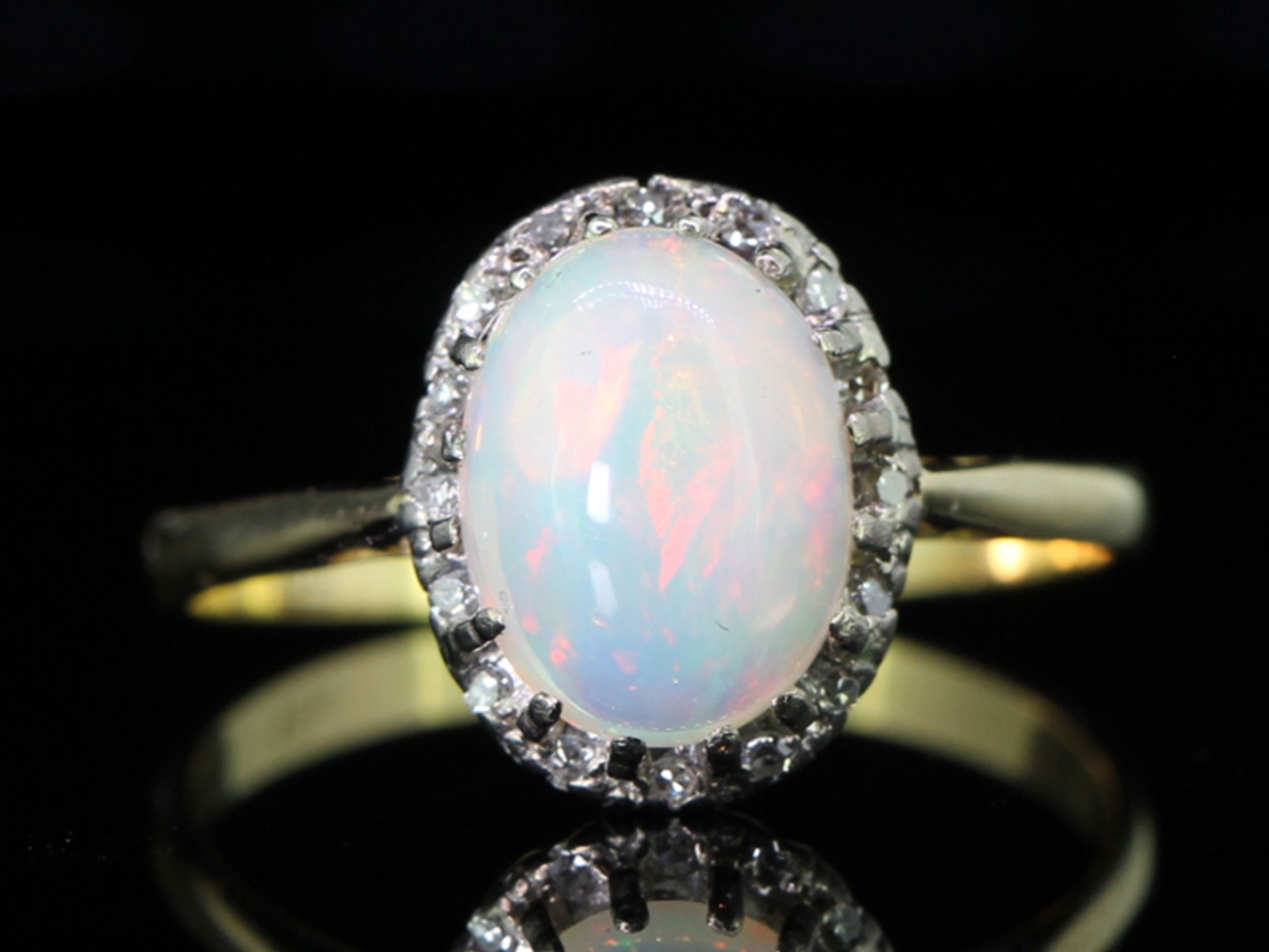 Wonderful vintage opal and diamond cluster 18 carat gold ring