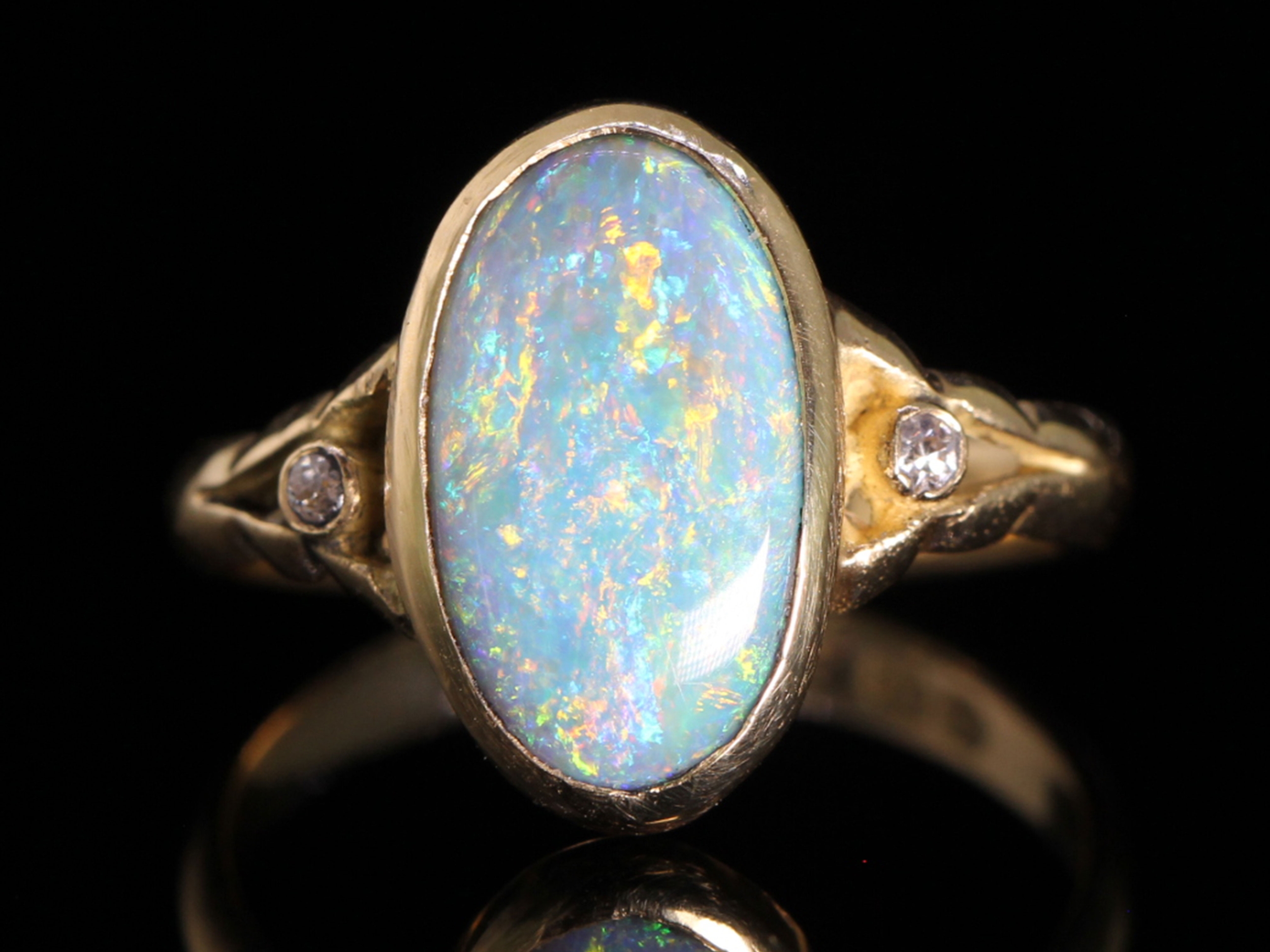 Edwardian 2ct black opal and diamond ring