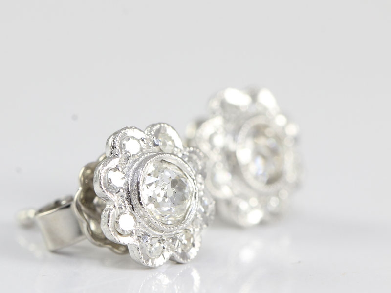 Pretty diamond daisy cluster 18 carat gold stud earrings