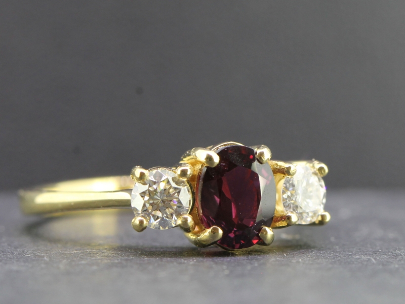 Fabulous ruby and diamond 18 carat gold trilogy ring