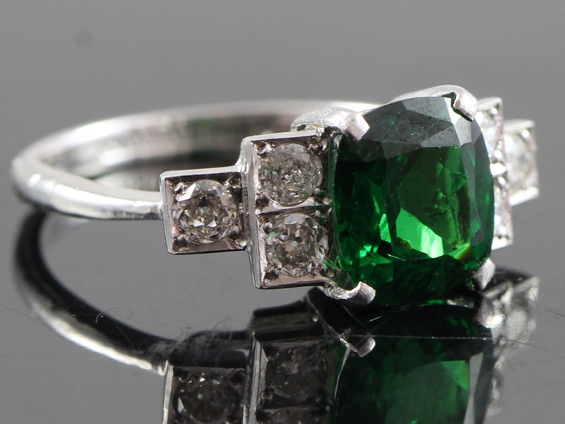 Stunning tsavorite and diamond art deco inspired platinum ring