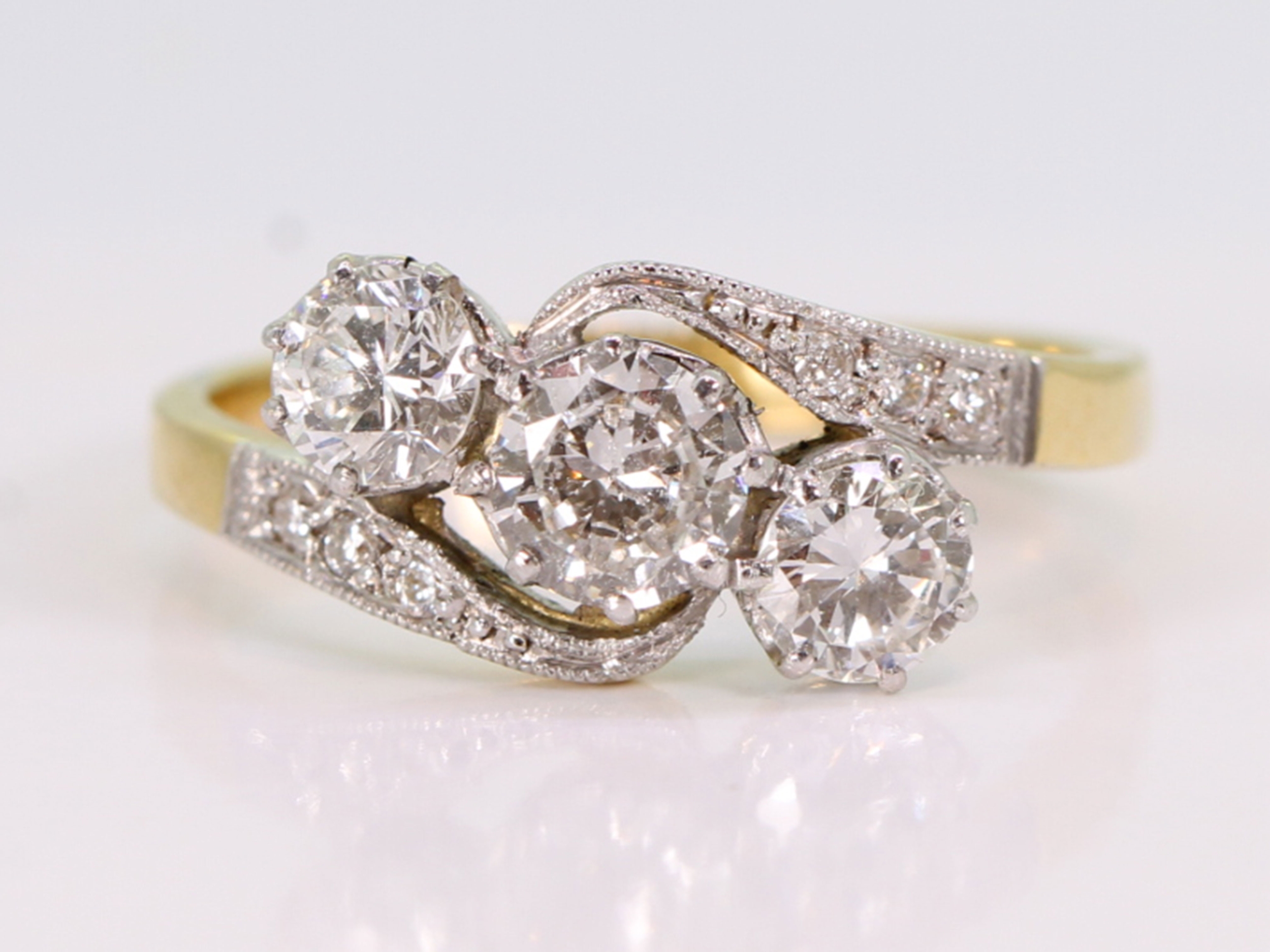 Antique trilogy diamond  18ct gold crossover ring circa 1930s 