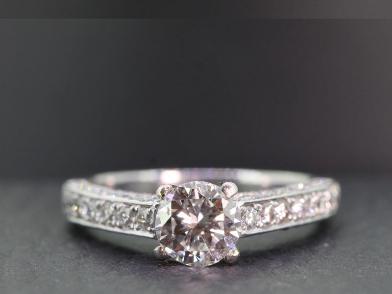 Beautiful diamond solitaire with diamond shoulders platinum ring