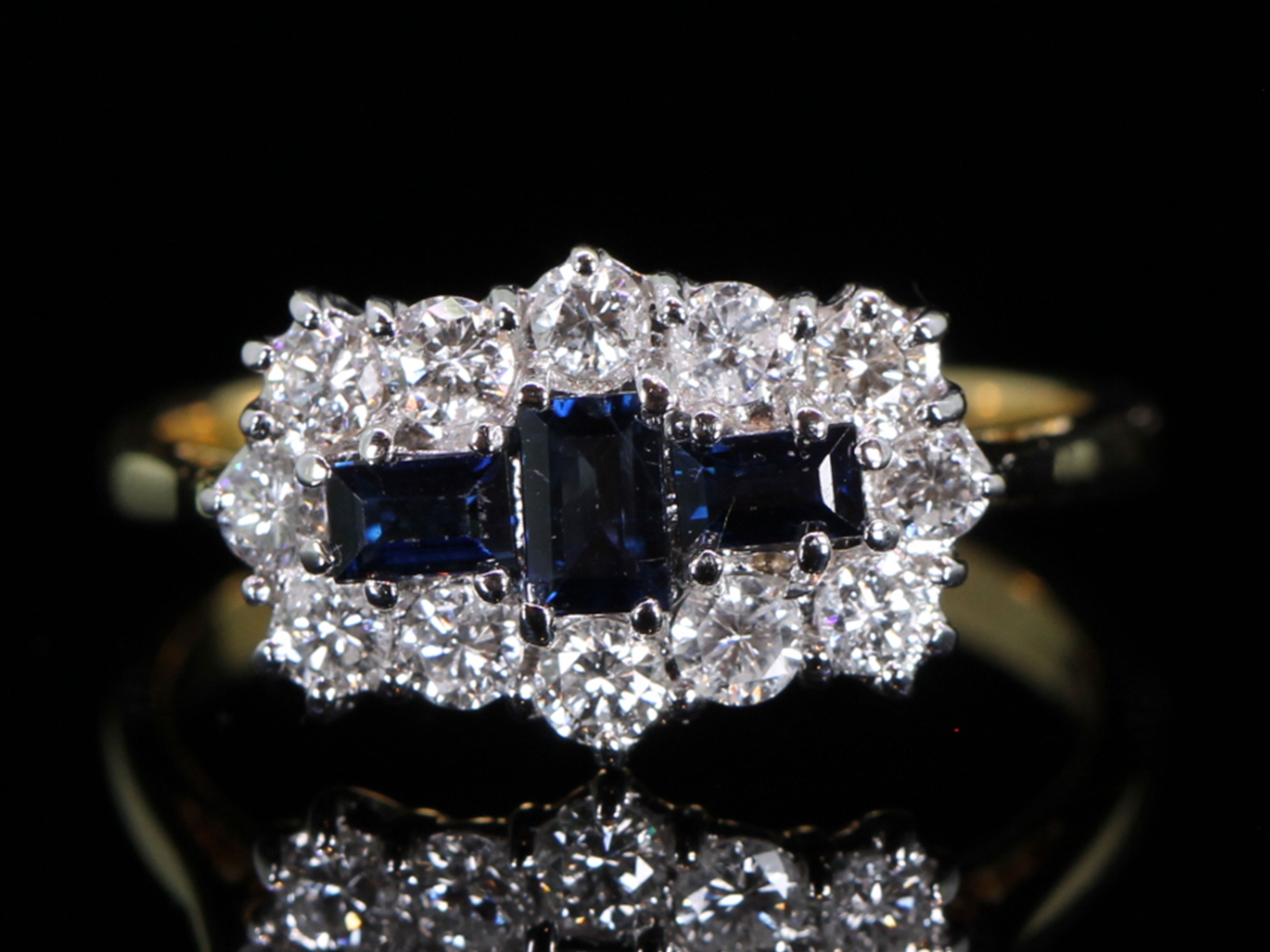 Sapphire and diamond cluster 18 carat gold ring 