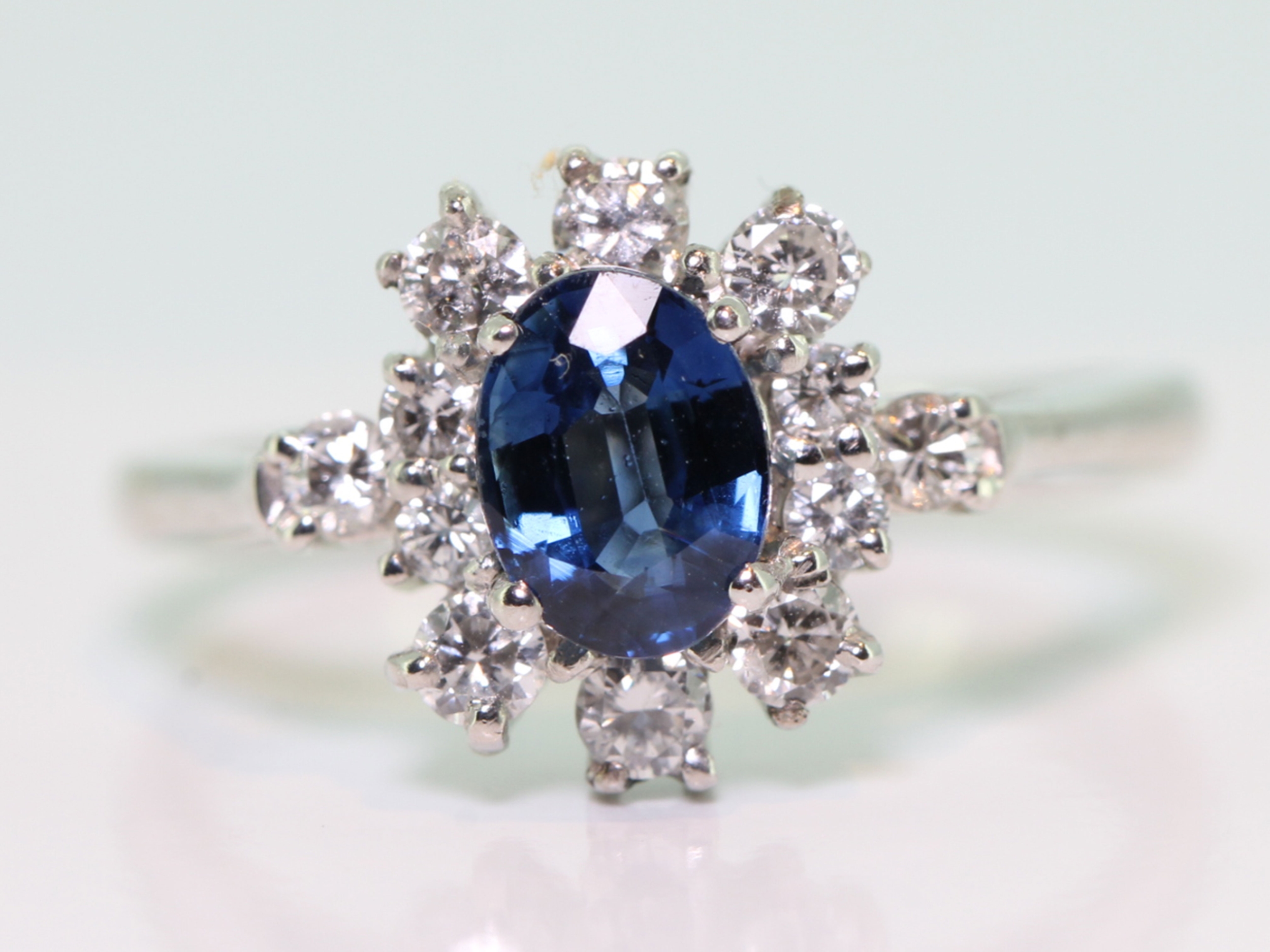 Sophisticated sapphire and diamond 18 carat gold cluster ring			