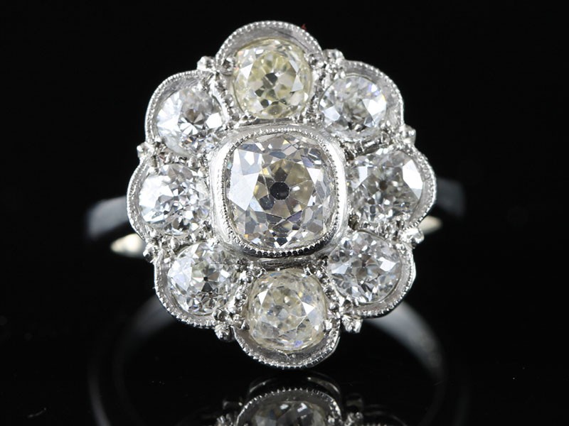 Fabulous old mined diamond cluster platinum ring