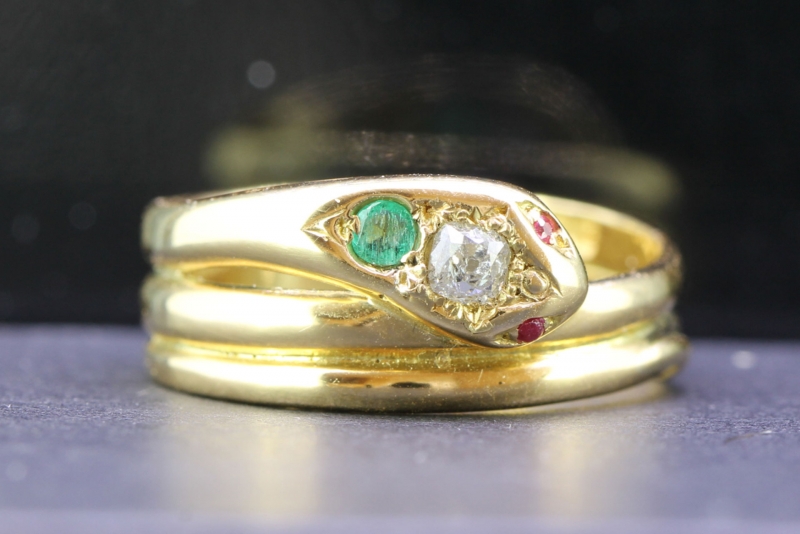 Beautiful emerald ruby and diamond 18 carat gold snake ring