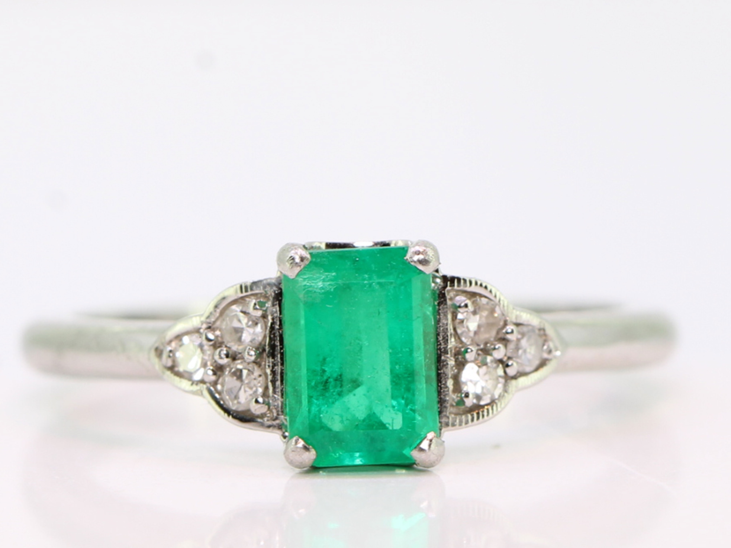 Wonderful emerald and diamond art deco inspired platinum ring 