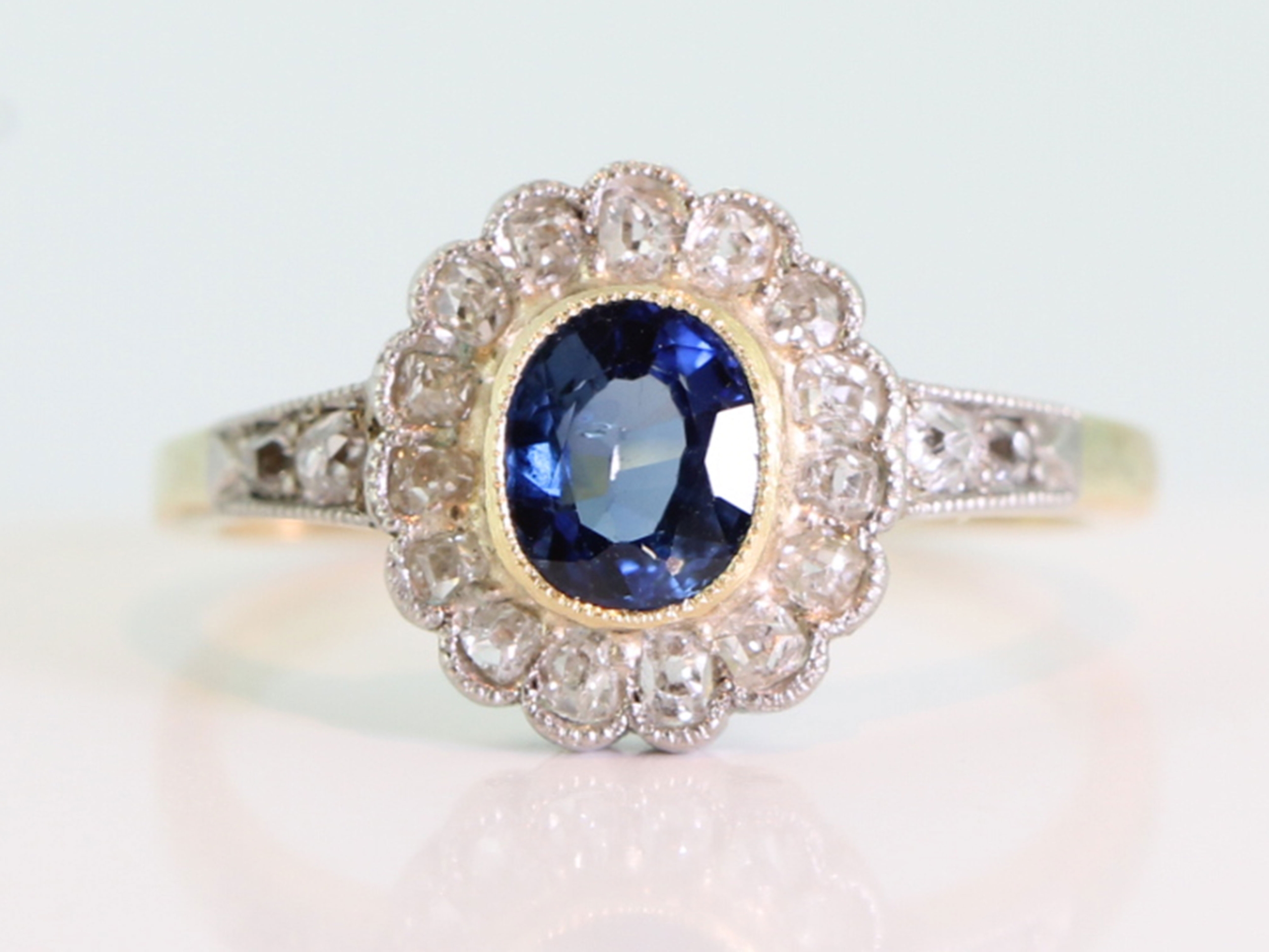Elegant sapphire and diamond 18 carat gold cluster ring