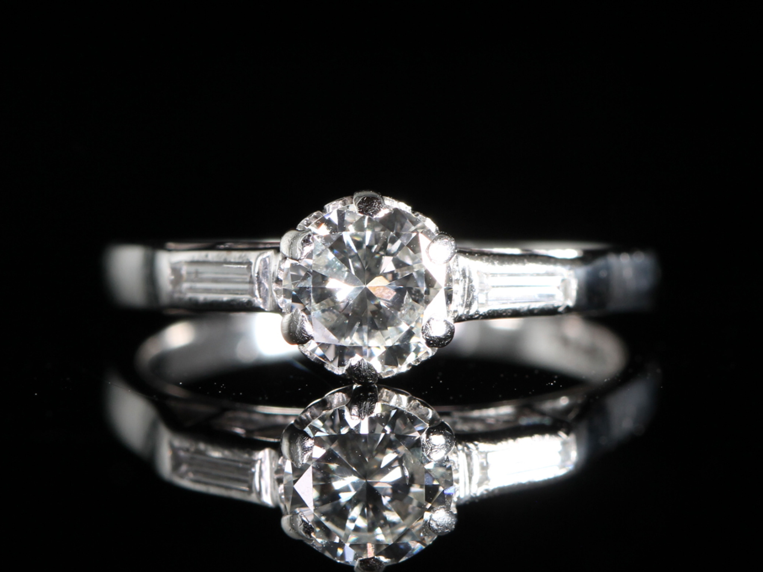 Circa 1950s diamond solitaire platinum ring