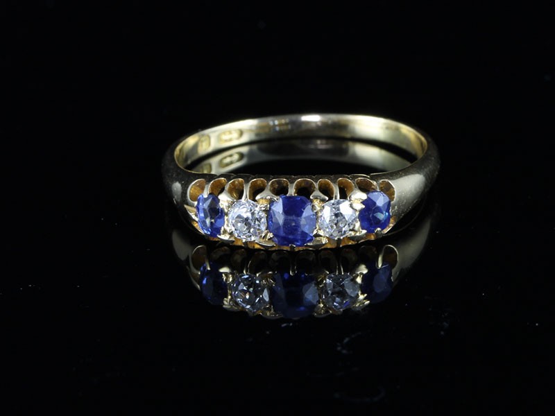 A fabulous 18ct gold edwardian diamond and sapphire gypsy ring