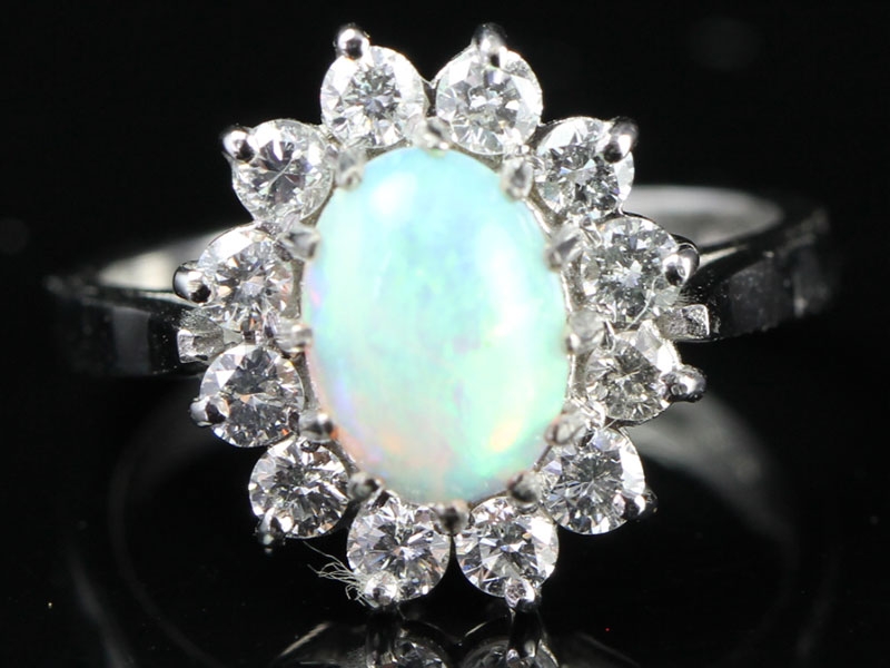 Breath taking australian opal and diamond 18 carat gold cluster ring