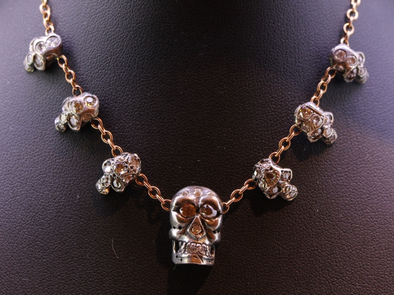 Fabulous seven skull and diamond silver set 15 carat gold necklace