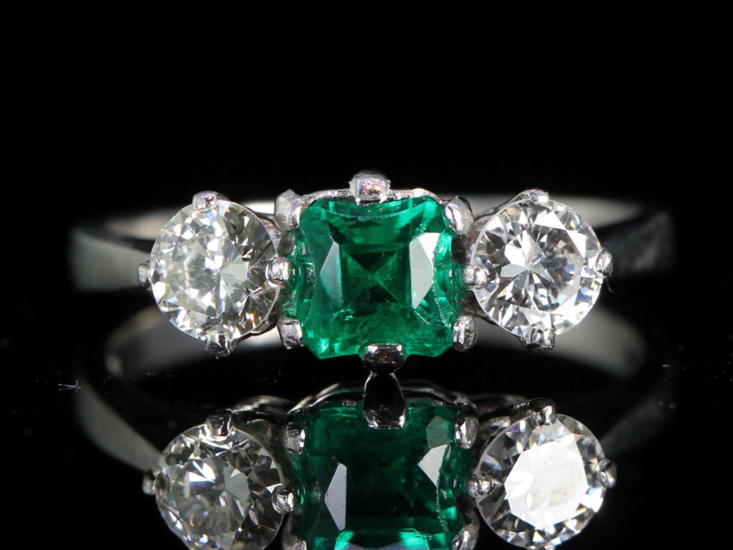 Art deco colombian emerald and diamond platinum trilogy ring