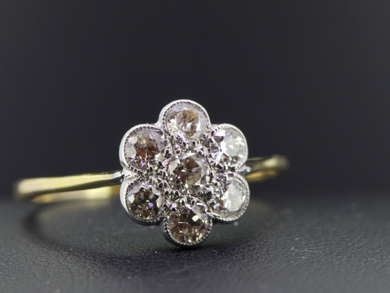 Delightful edwardian diamond daisy cluster 18 carat gold ring