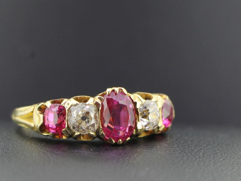 Vivacious ruby and diamond five stone 18 carat gold ring