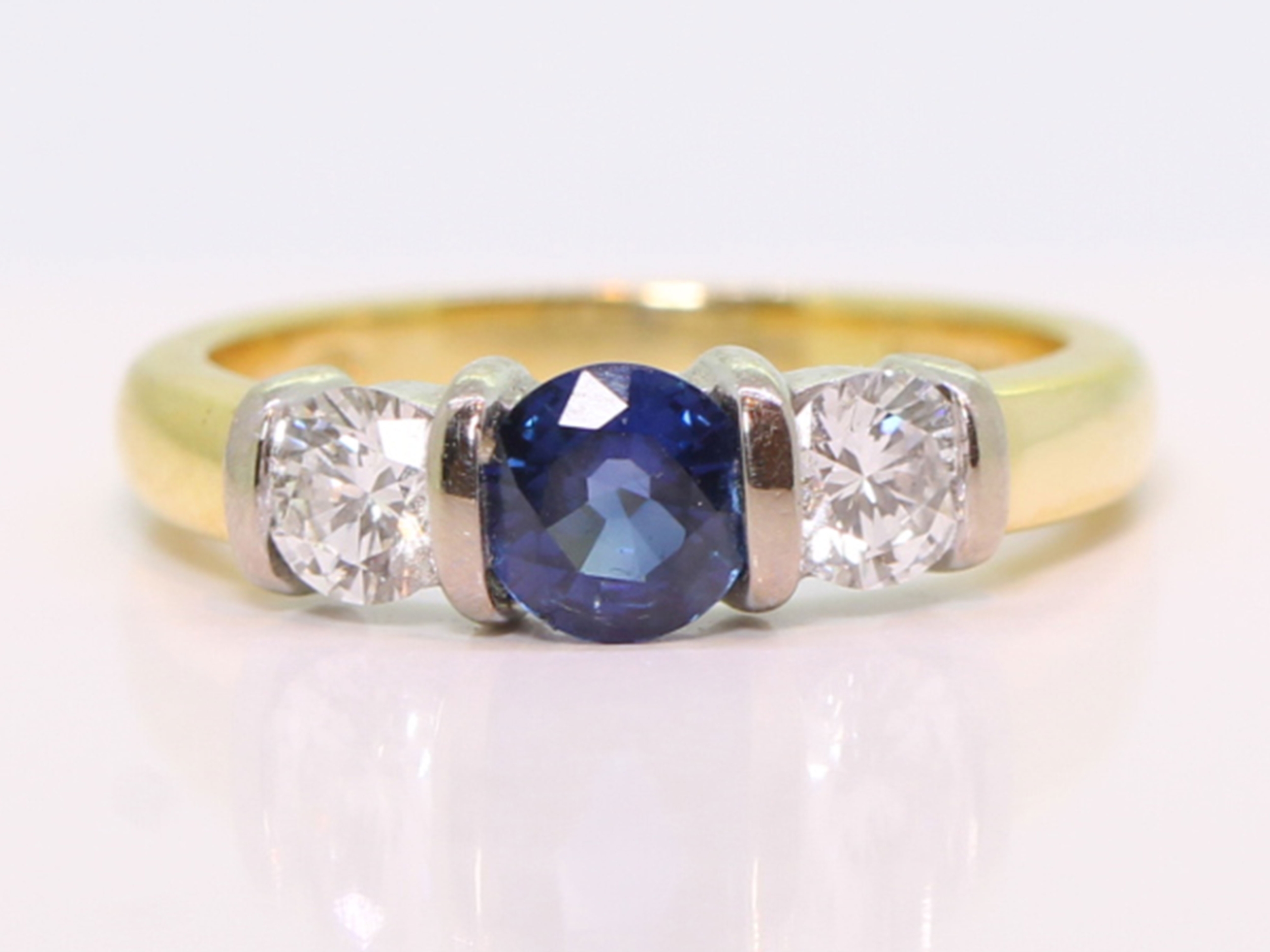 Vintage sapphire and diamond 18ct gold trilogy ring