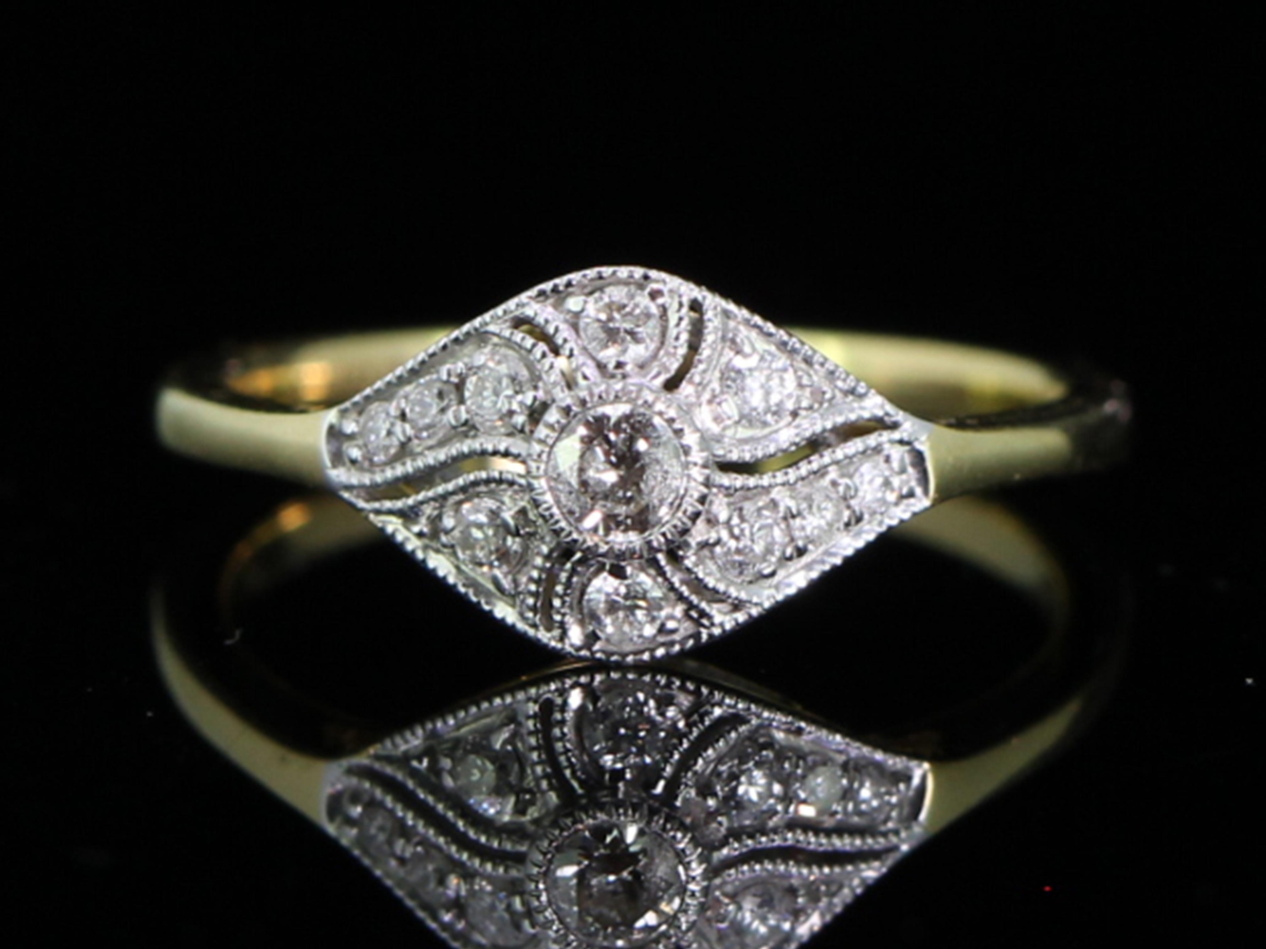 Unique art deco inpsired diamond 18 carat gold ring