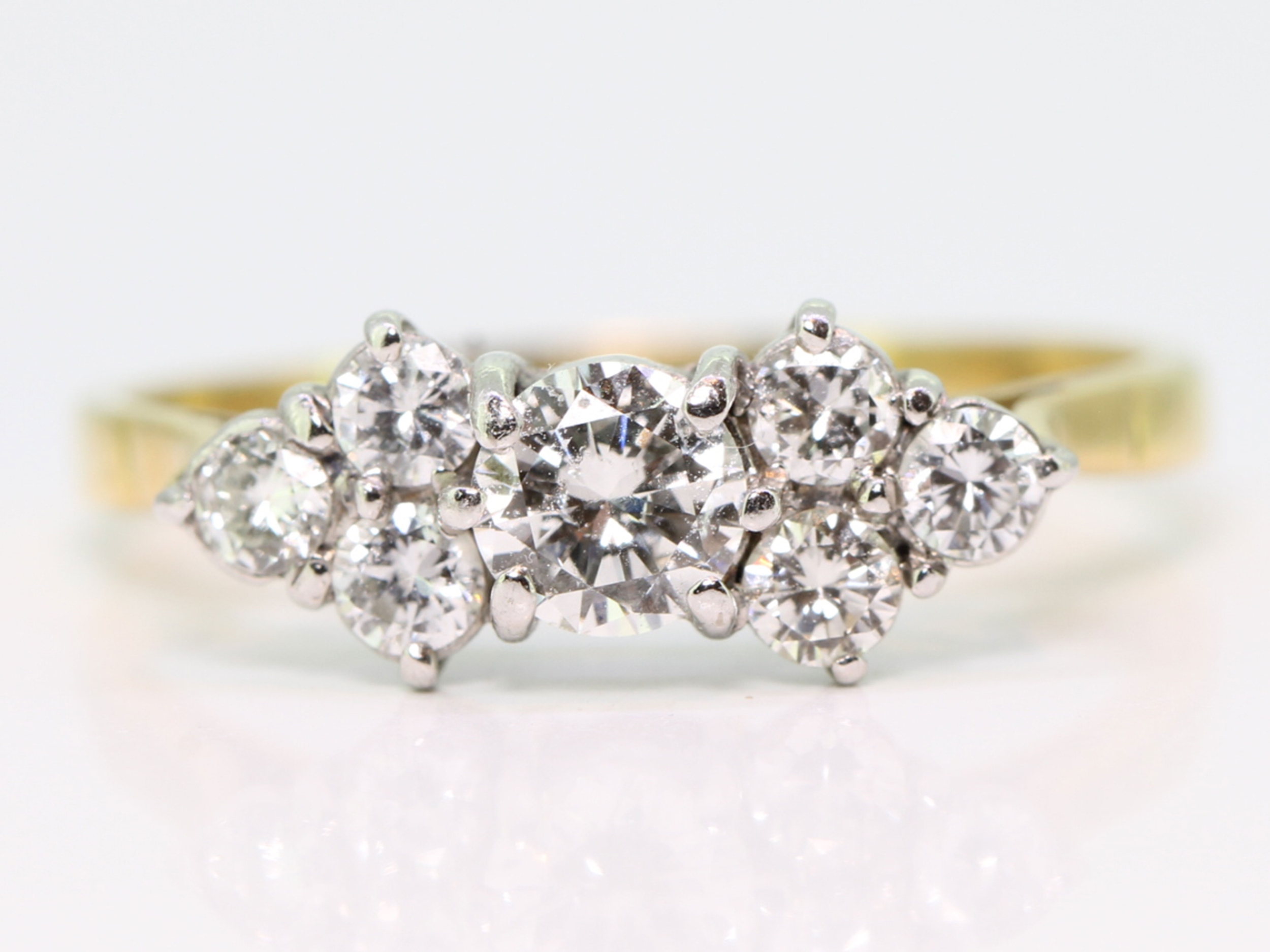 Stunning seven stone diamond cluster  18 carat gold ring