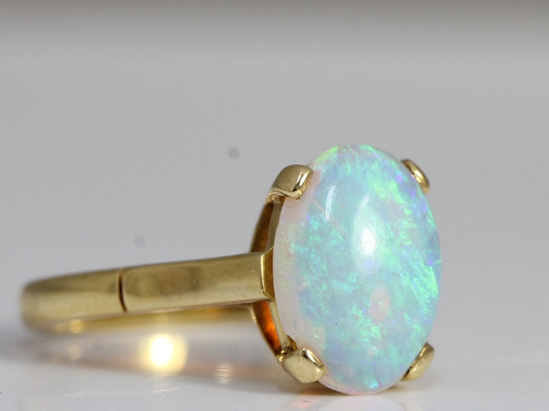 Enchanting art deco australian opal 18 carat gold ring 