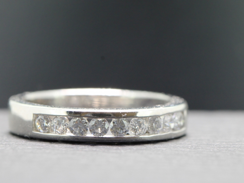 Elegant 18 carat gold diamond half eternity ring