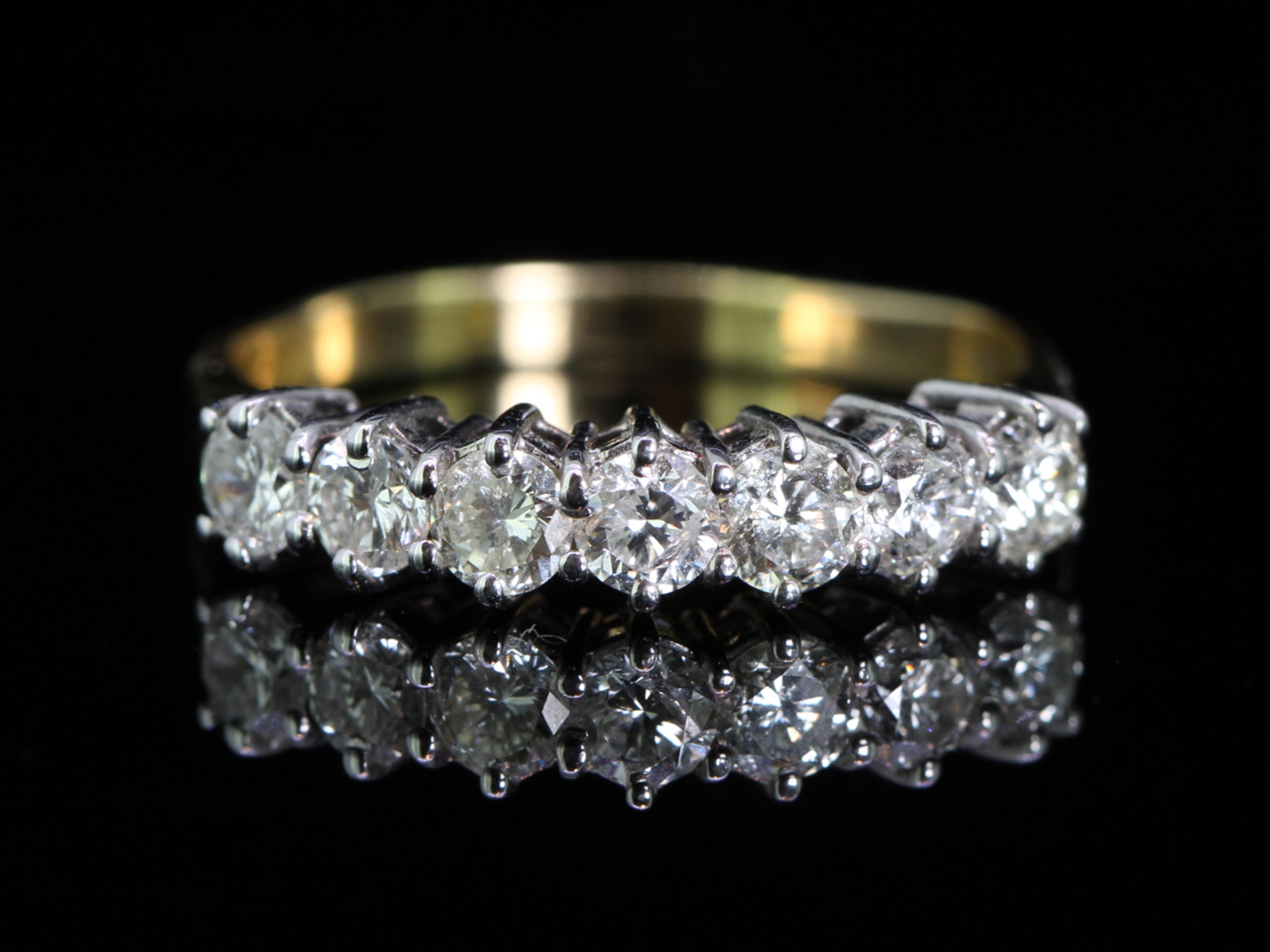 Stunning seven stone diamond 18 carat gold eternity ring