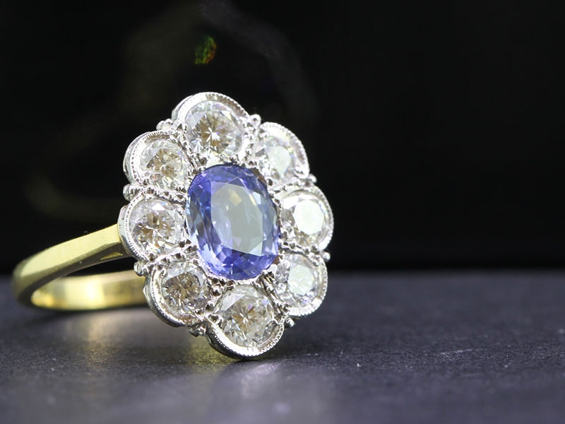 Stunning ceylon sapphire and diamond 18 carat gold cluster ring