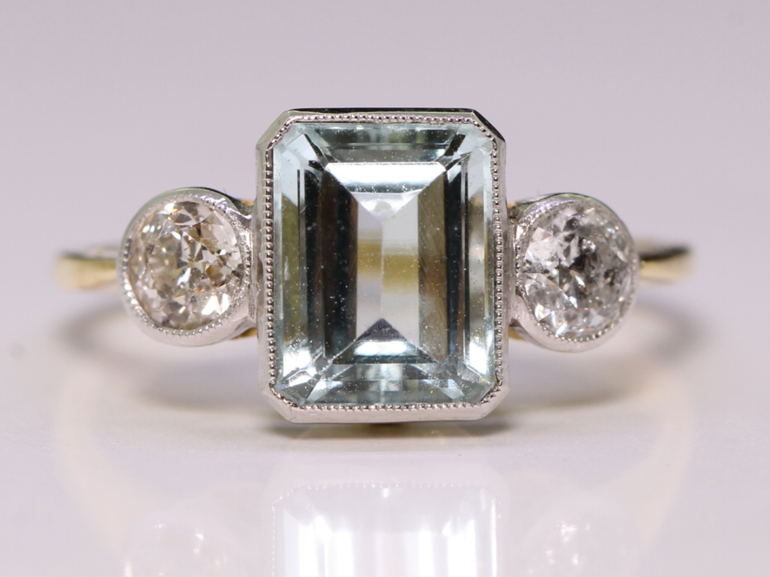 Art deco aquamarine and diamond 18ct gold trilogy ring