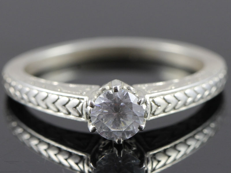 Romantic art nouveau inspired engagement 18 carat white gold ring