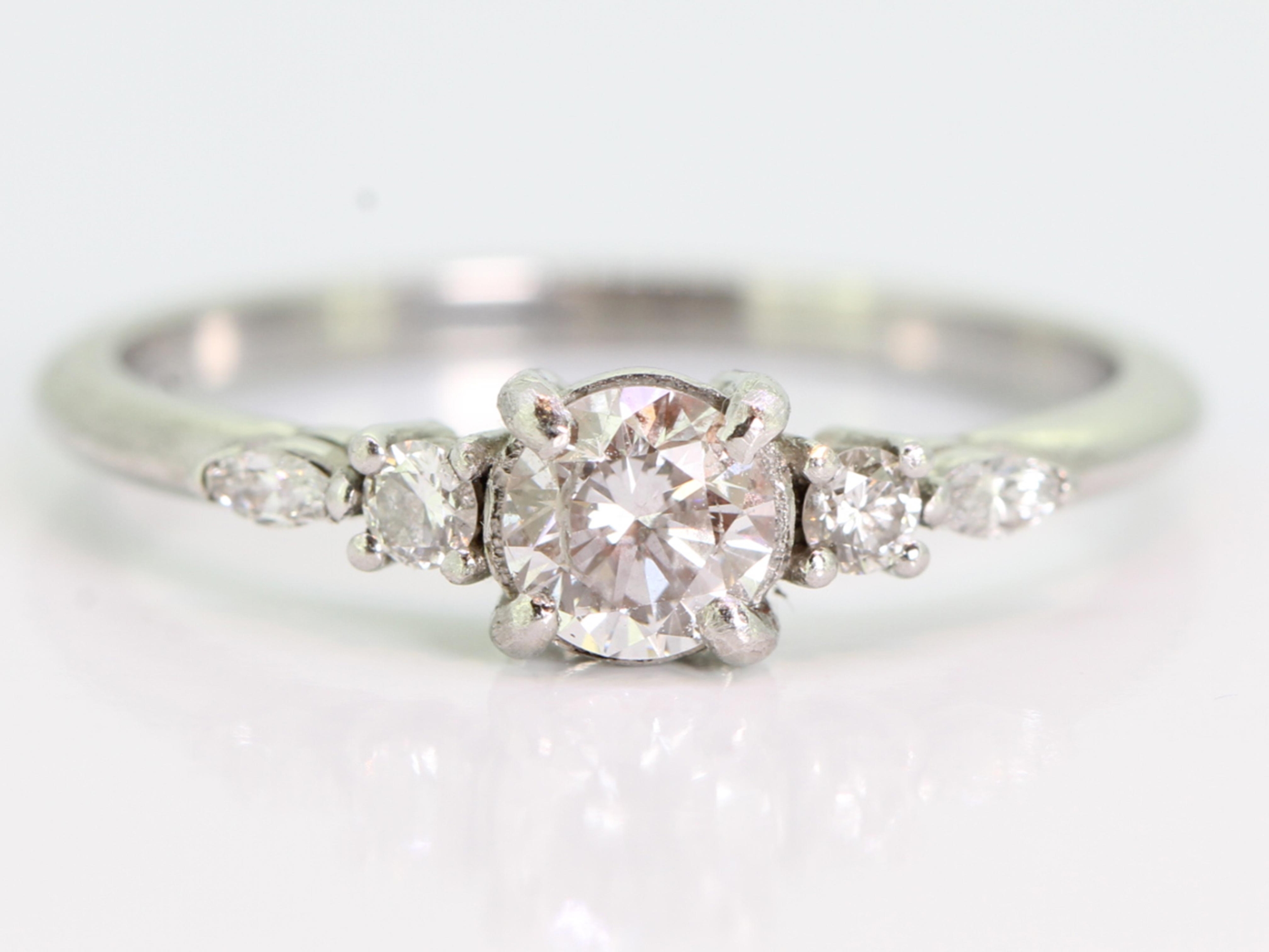Charming diamond floral detail platinum ring