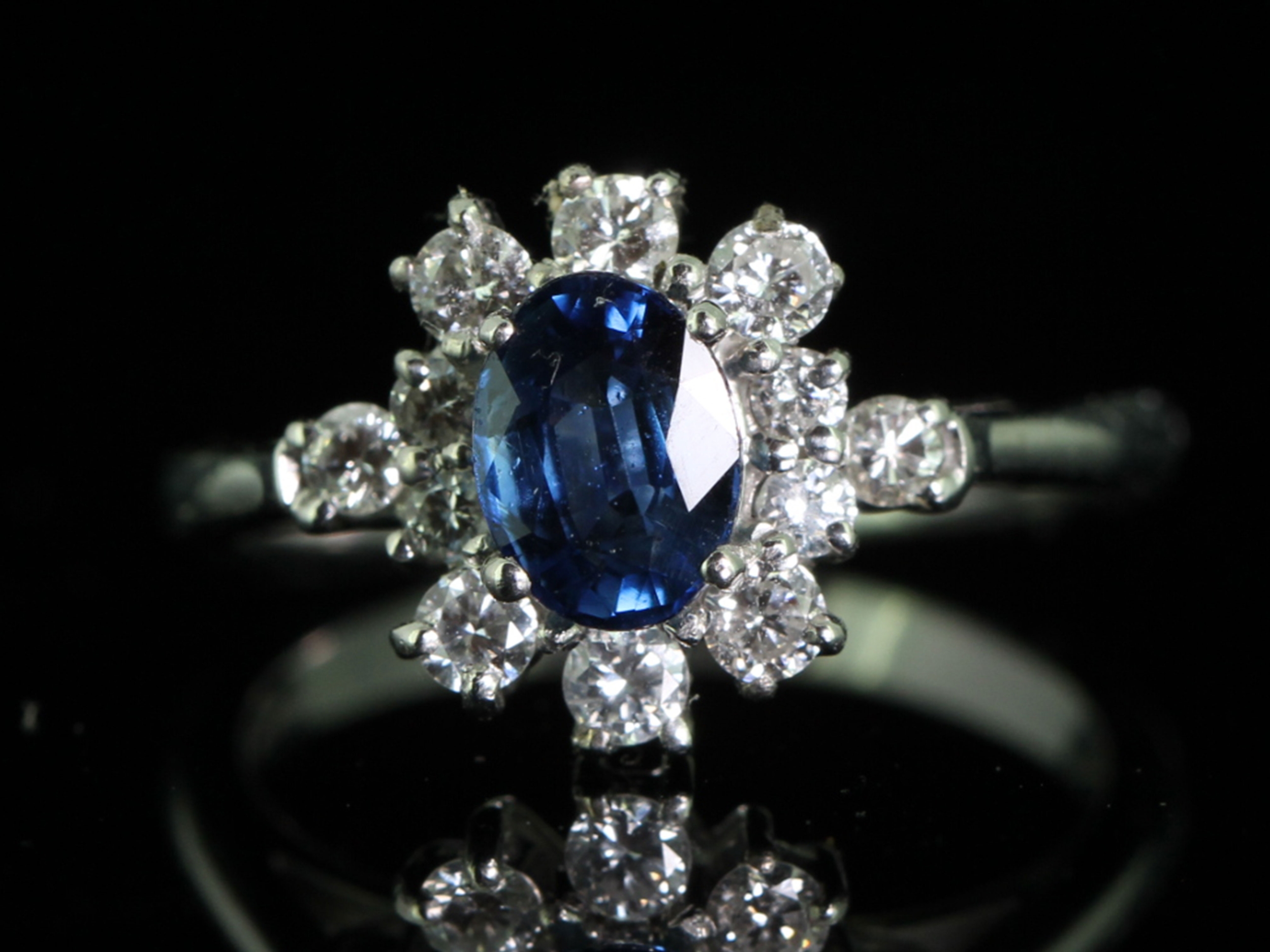Sophisticated sapphire and diamond 18 carat gold cluster ring			