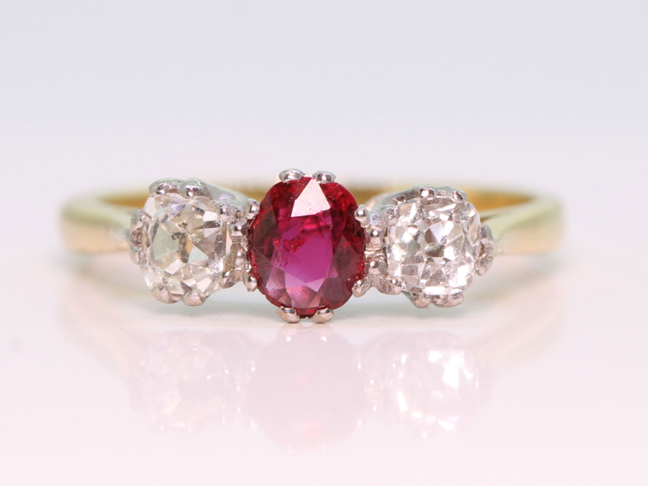 Edwardian ruby and diamond platinum and 18ct gold trilogy ring