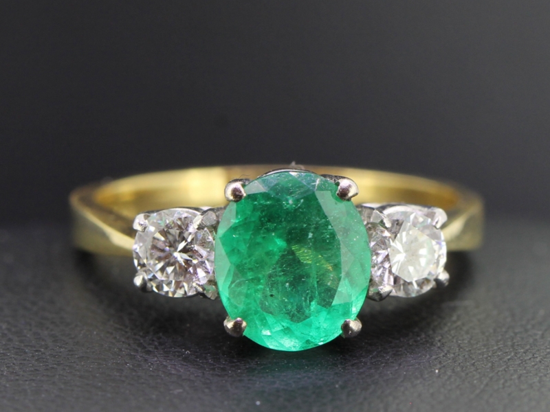 Stunning columbian emerald and diamond trilogy 18 carat gold ring