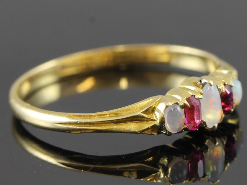 Pretty ruby and opal edwardian 18 carat gold ring
