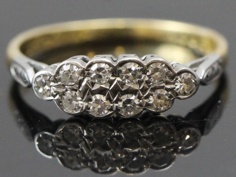 Pretty two row diamond platinum and 18 carat gold ring